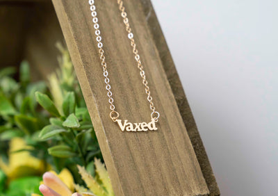 “vaxed” pendant necklace